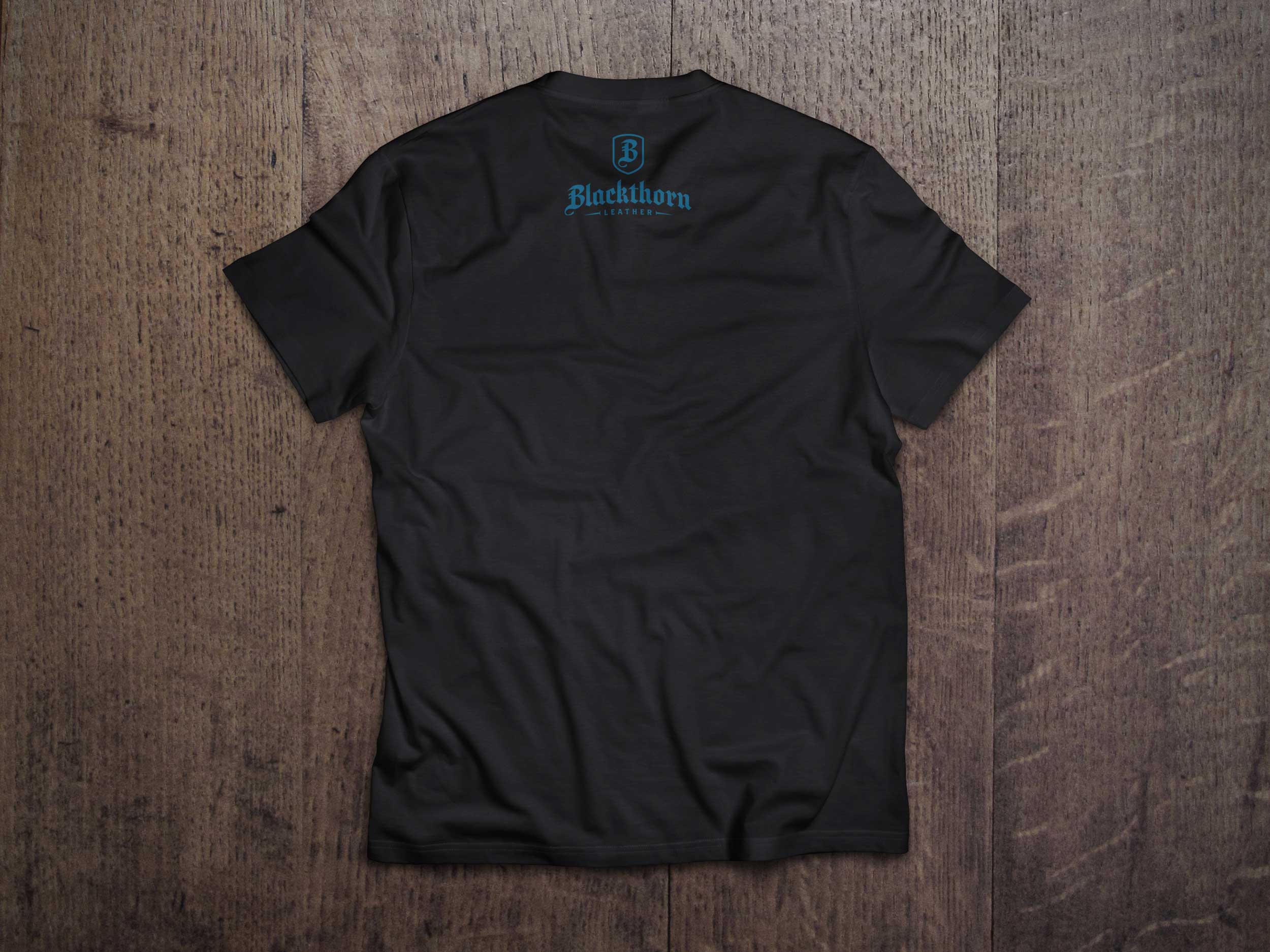 Flatlay of t-shirt featuring "Smooth Seas" artwork